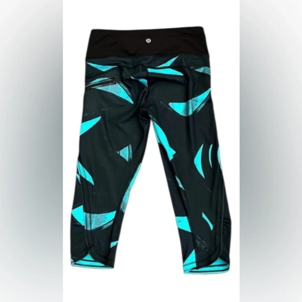 Lululemon women’s 6 Run Top Speed cropped peacock blue & black leggings